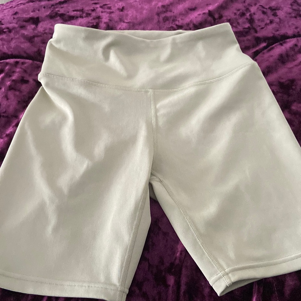 Stretchy green biker shorts, size M!